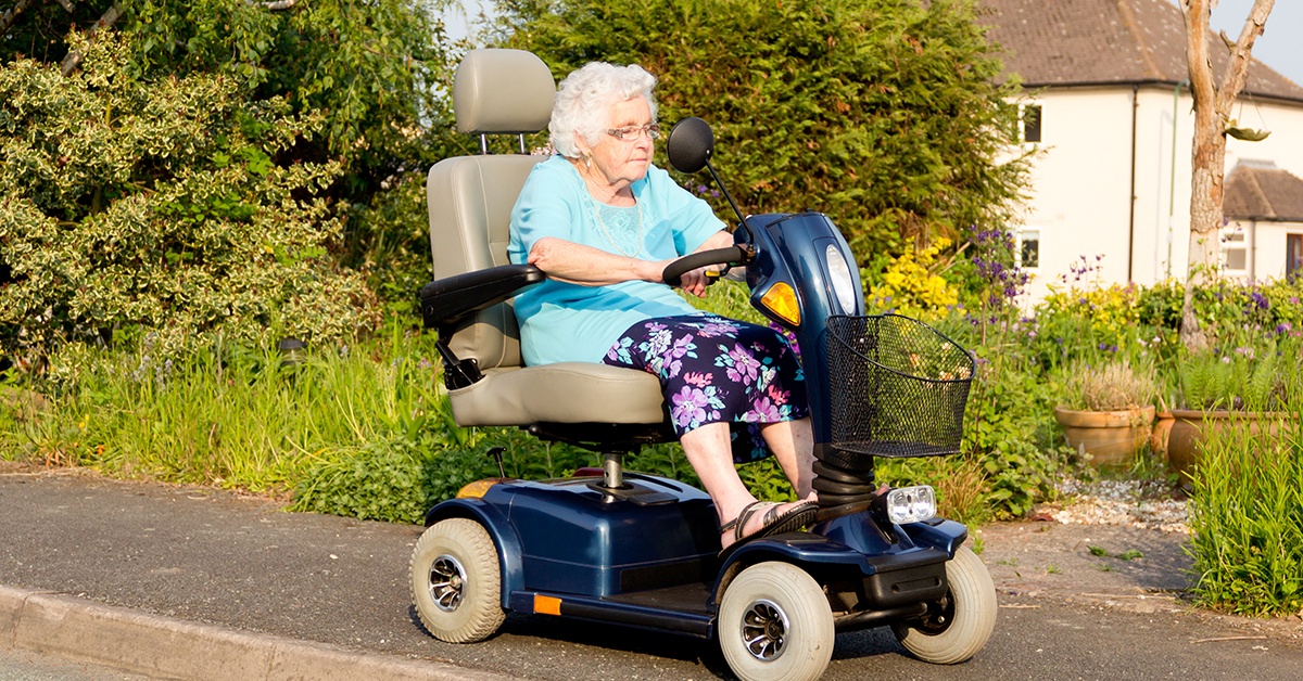 Senior woman on mobility scooter