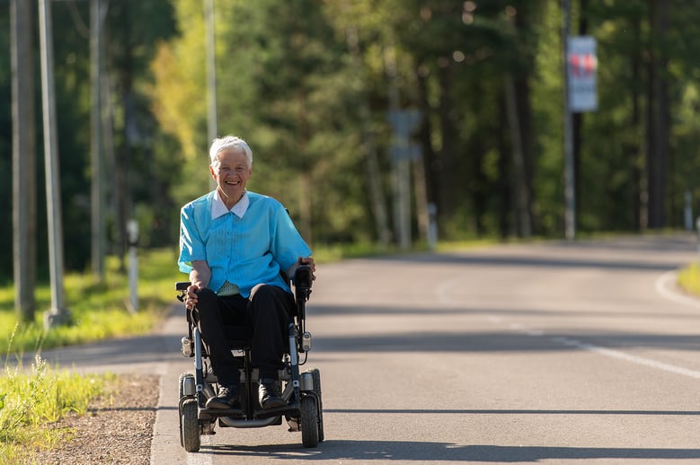 smiling-disabled-old-woman-in-a-wheelchair